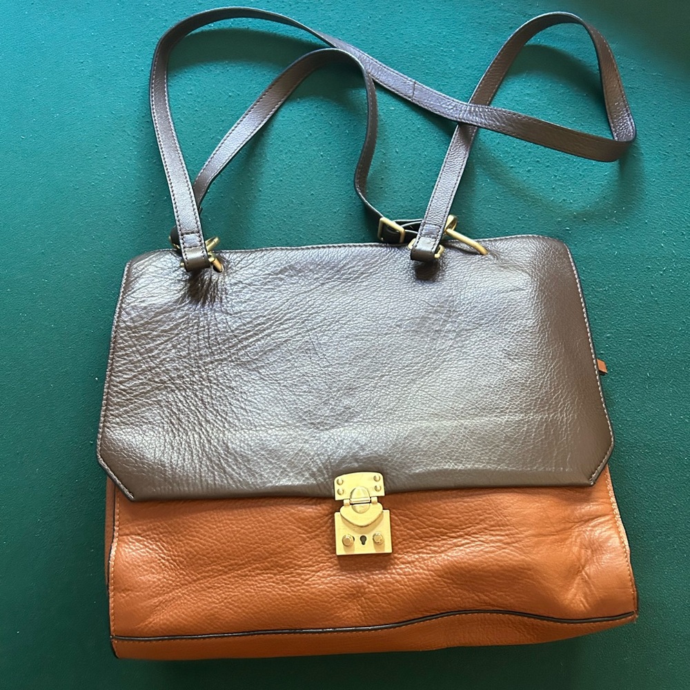 Zara Women two tone leather purse with gold hardware.